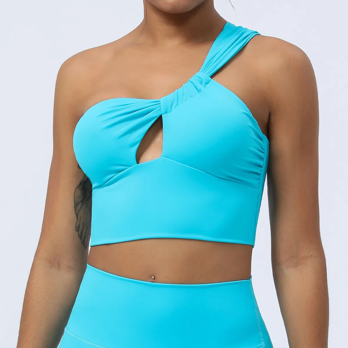 Trix One-Shoulder Ruched Cutout Cropped Workout Top sports top & bras Castello Clothing Line