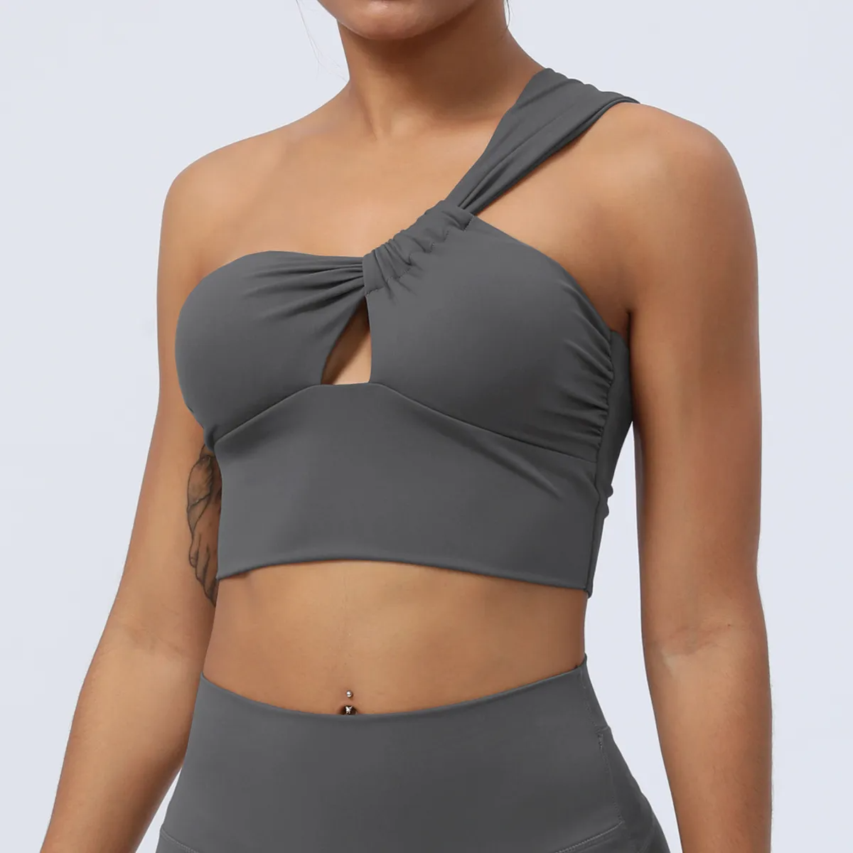 Trix One-Shoulder Ruched Cutout Cropped Workout Top sports top & bras Castello Clothing Line